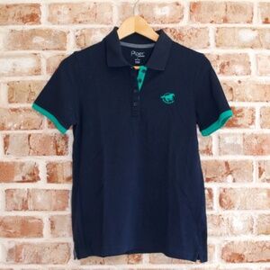 NWOT women's Piper by SmartPak navy short sleeve polo with teal logo, size M